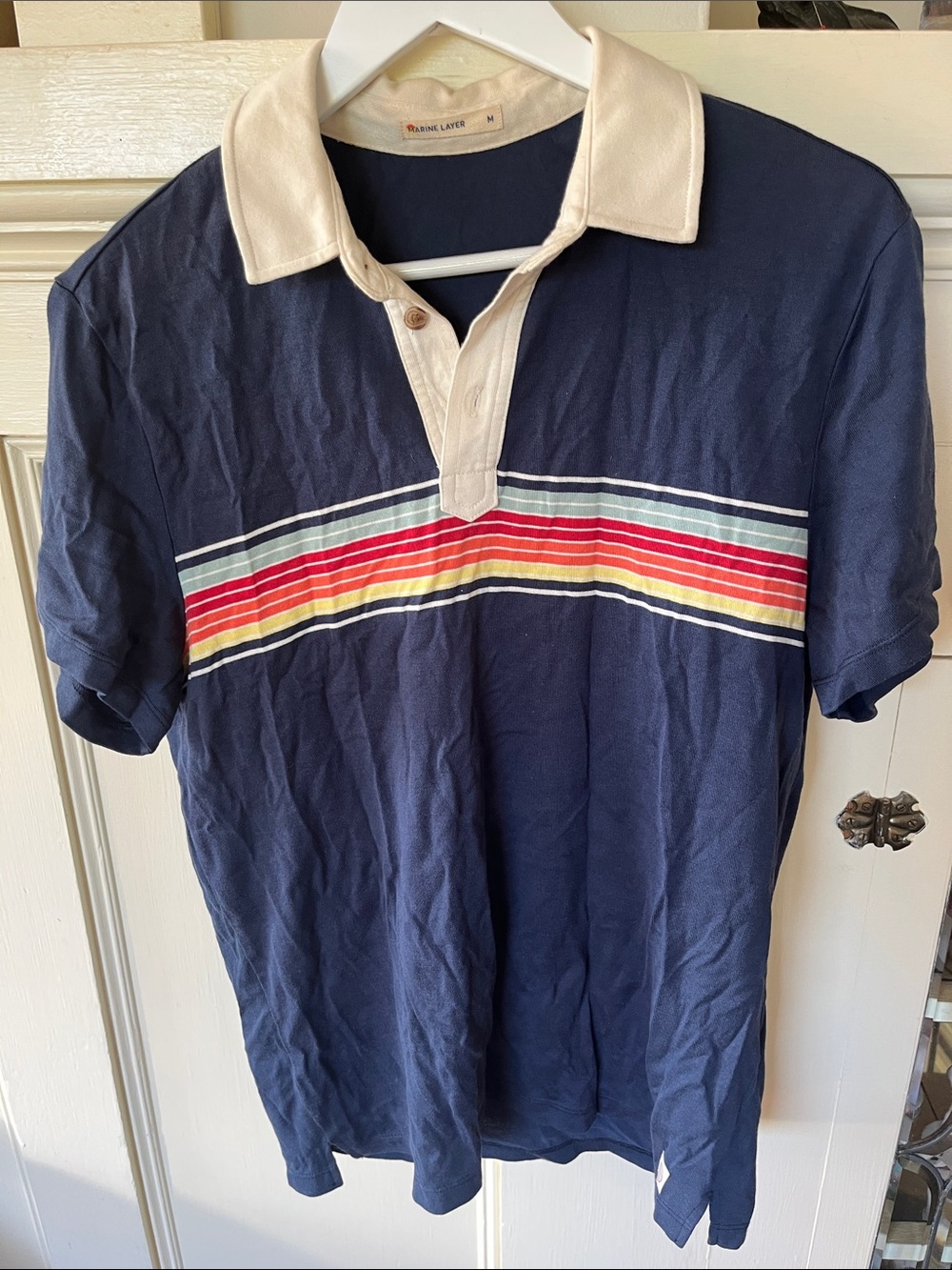 Marine Layer Navy Polo with Cream Collar and Rainbow Chest Stripe